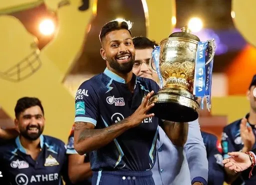 Hardik Pandya with Trophy ( hairstyle of Hardik)