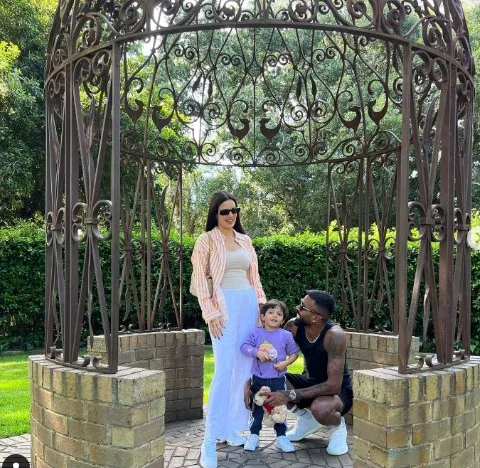 Hardik Pandya with his wife Natasa and son