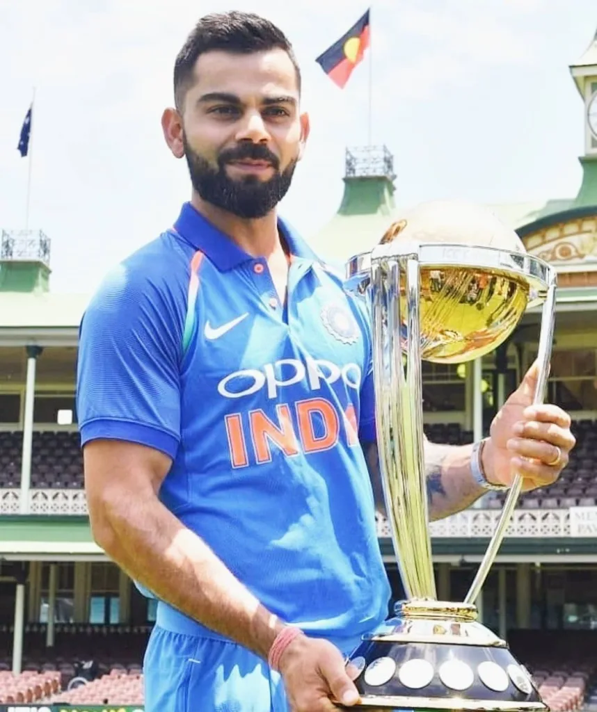 Virat-Kohli-with-champions-Trophy-2013 n